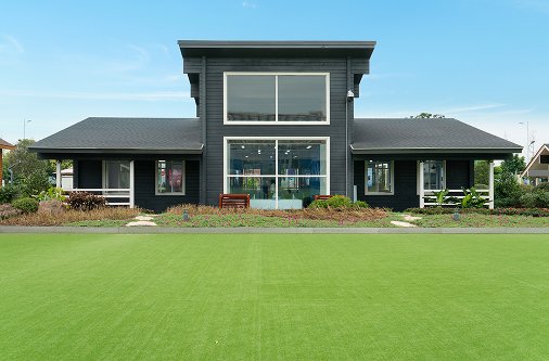 Clean and sanitized front yard lawn after professional pooper scooper waste removal